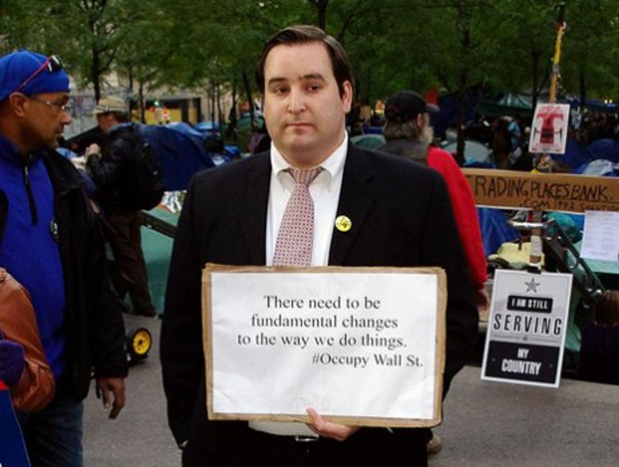 An Occupy Wall Street protester in banker's attire