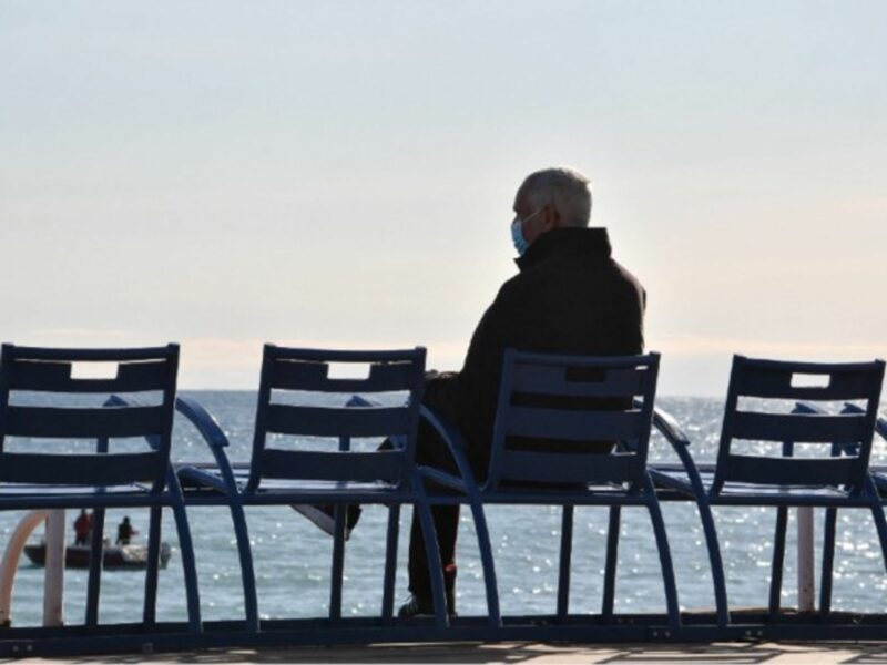 An old man enjoying the sun in Nice, in February 2021.