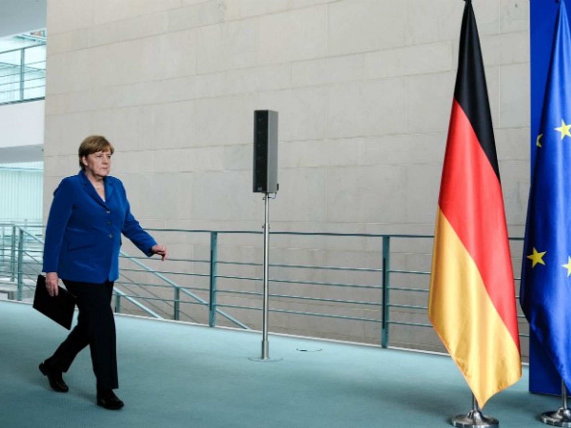 Angela Merkel attends press conference after shootout in Munich.