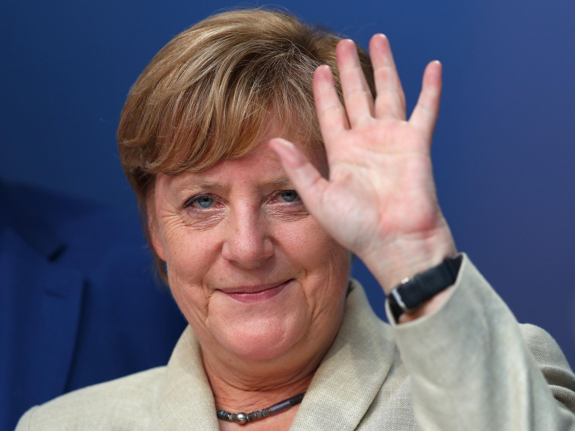 Angela Merkel waves to the crowd