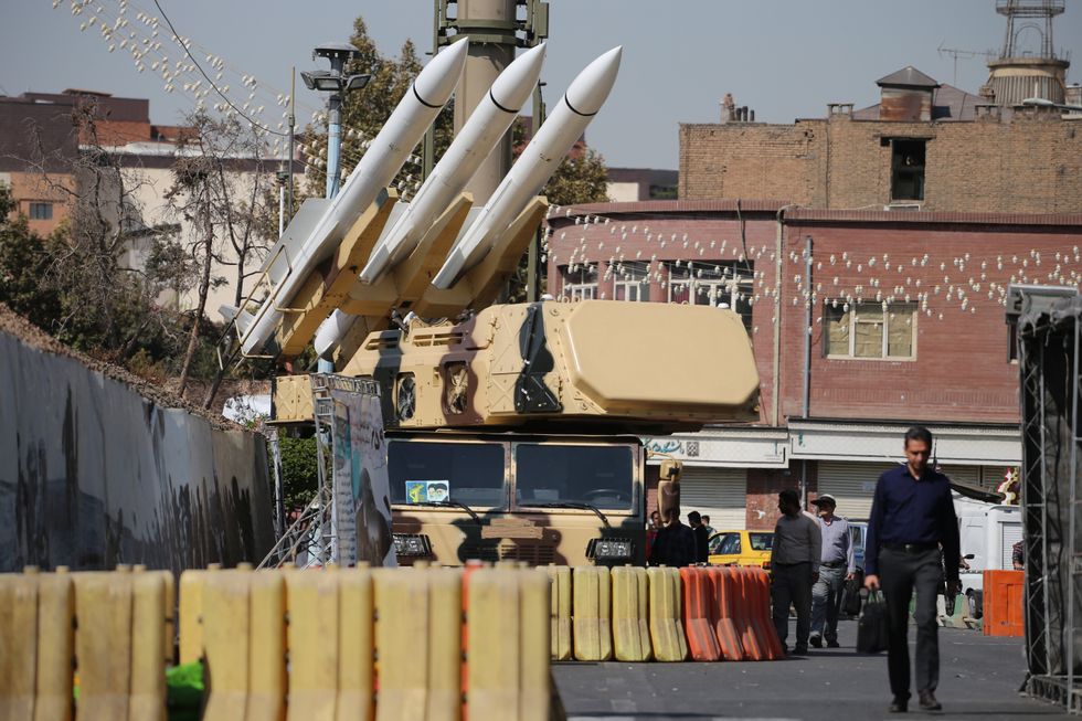 Anti-aircraft missiles are pictured, during a military exhibition commemorating the Iran-Iraq war (1980-88) anniversary, at Baharestan Square in downtown Tehran. Military equipment displayed by Iran's army and paramilitary Revolutionary Guard to celebrate 'Defence Week' marking the 43rd anniversary of the start of the 1980-88 Iran-Iraq war.