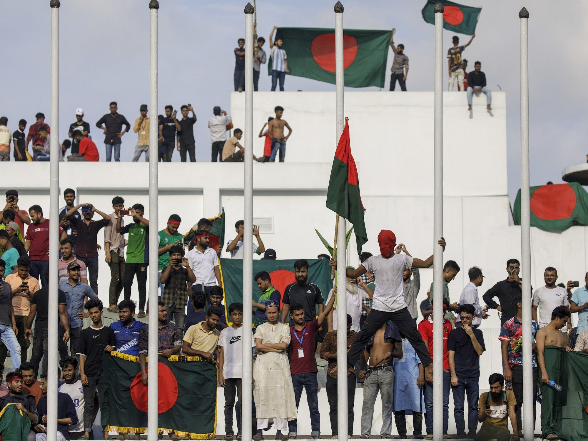 Anti-government demonstrators storm Prime Minister Sheikh Hasina's palace in Dhaka after her 15-year rule ended, Dhaka, Bangladesh, Aug. 5, 2024.