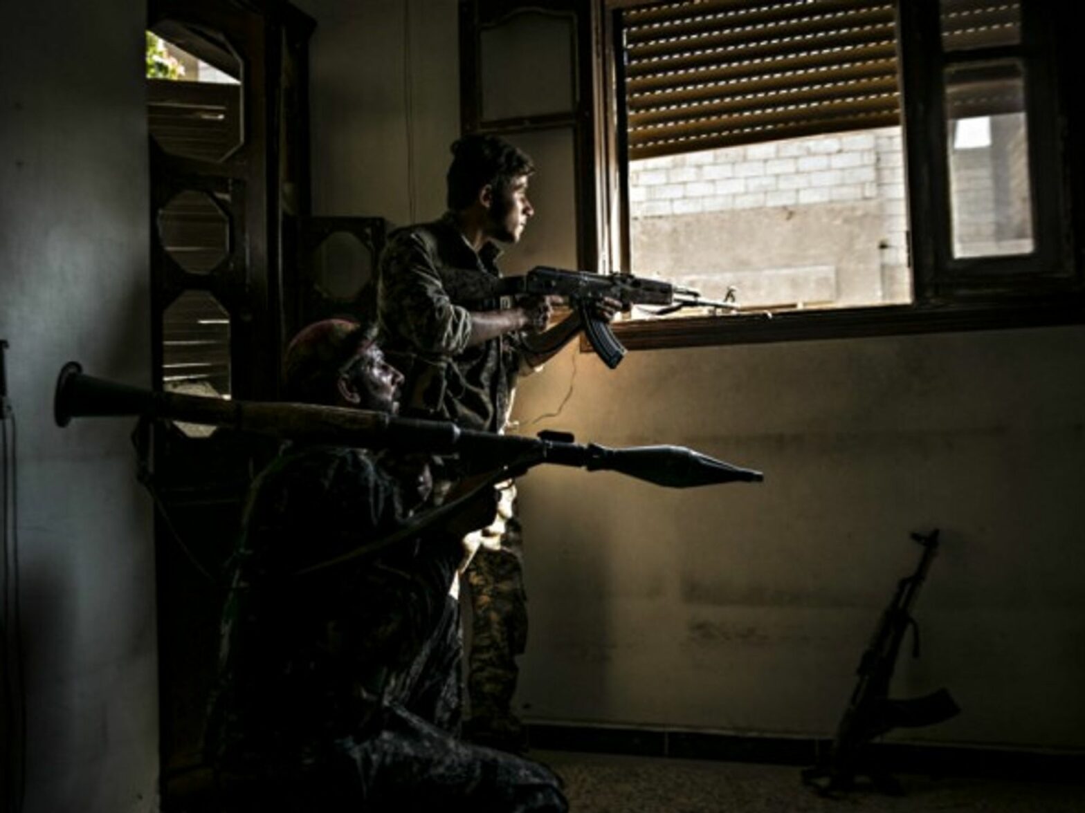 Anti-ISIS fighters in Raqqa in August.