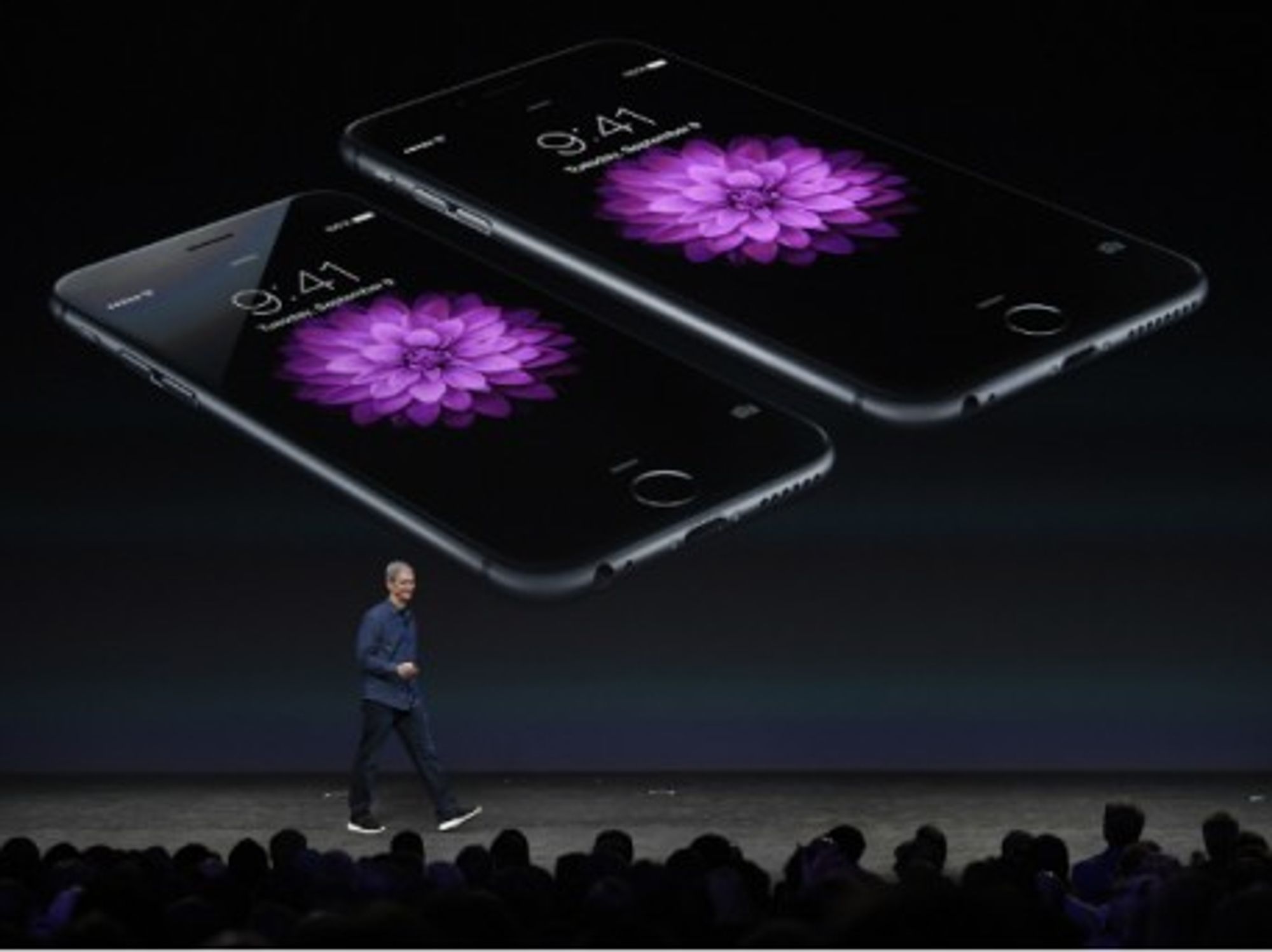 Apple CEO Tim Cook unveils the new iPhones 6 and 6 Plus