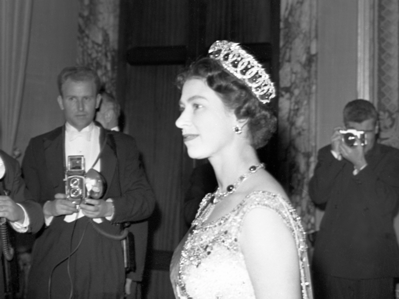 Archive photo of ​Queen Elizabeth II surrounded by photographers in Rome in 1961