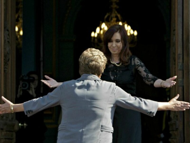 Argentine President Cristina Kirchner greets Brazil's Dilma Rousseff in April 2013