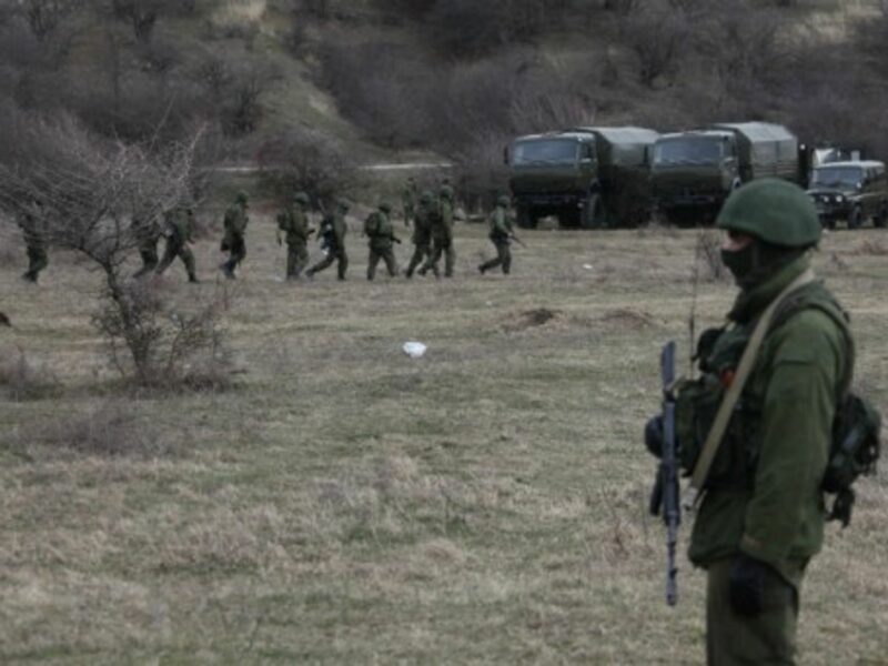 Armed guards outside a Ukrainian military compound in Simferopol, Crimea, on March 4