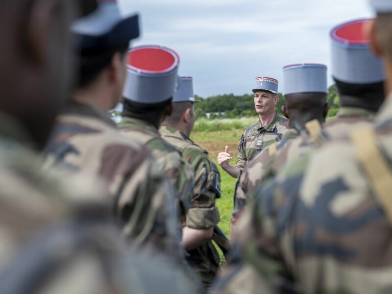 Army general speaking to soldiers.