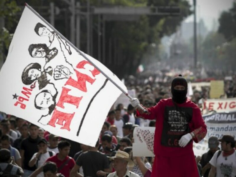 At a protest in Mexico City following news of the missing teens.
