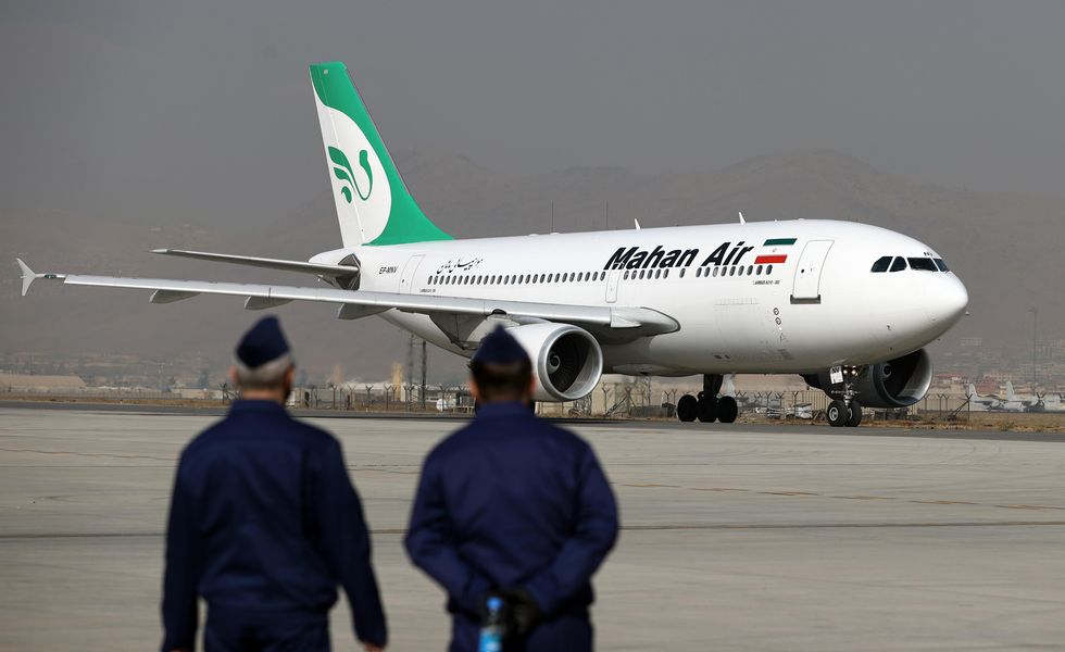 At Kabul Airport, an Airbus A310 aircraft operated by Iranian airline Mahan Air. Maduro's trip to Tehran coincided with a suspicious plane, known to be owned by Mahan Air, landing in Argentina, with a crew of 14 Venezuelans and five Iranians.