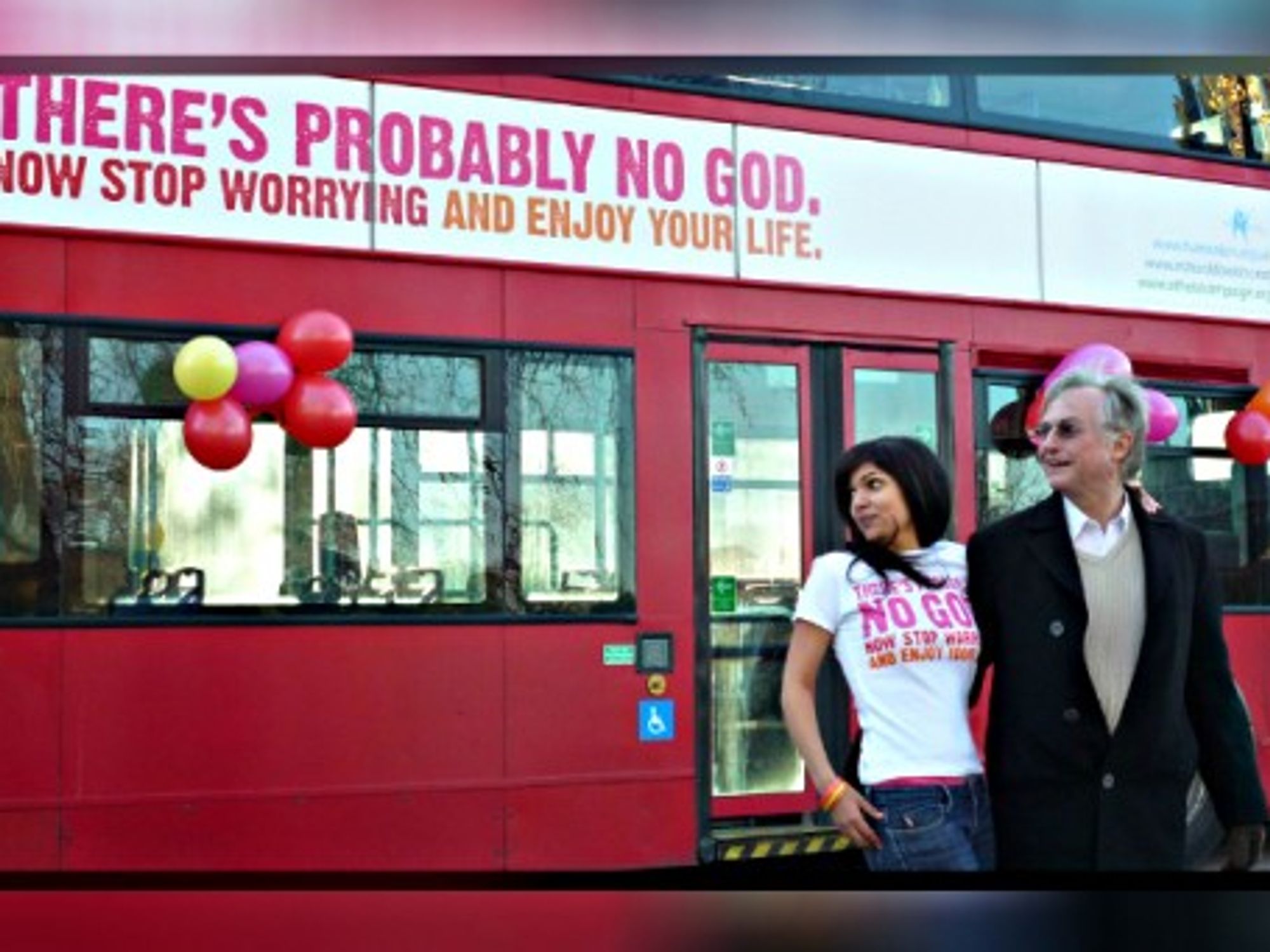 Atheist Richard Dawkins and bus campaign creator Ariane Sherine in London