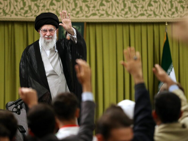 Ayatollah Ali Khamenei greets students during a Tehran meeting