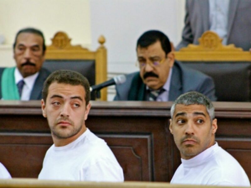 Baher Mohamed, left, and Mohamed Fadel Fahmy of al Jazeera English in court in Cairo last year
