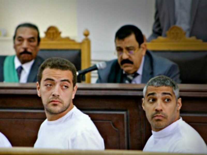 Baher Mohamed (left) and Mohamed Fahmy in a Cairo court in March 2014.