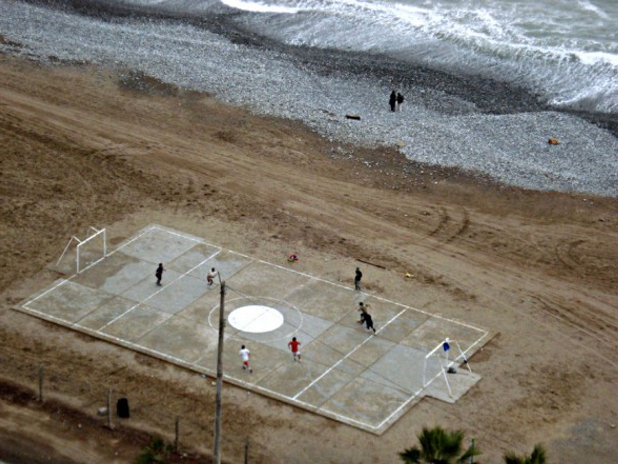 Beach futbol on the beach in Lima, Peru
