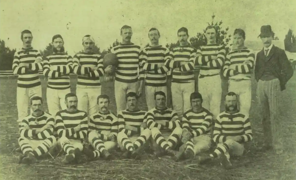 Becoming a New Zealander: Andrew Gilhooly (holding ball) with the AC rugby team in 1881.