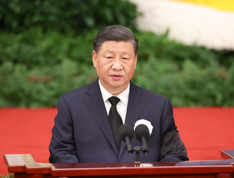 Beijing, December 2022. Xi Jinping addresses a memorial meeting.