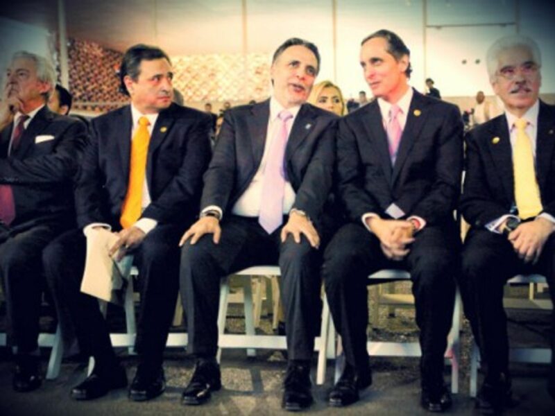 Bimbo Chairman Daniel Daniel Servitje (second from right) speaks with then Mexican Economy Minister Bruno Ferrari