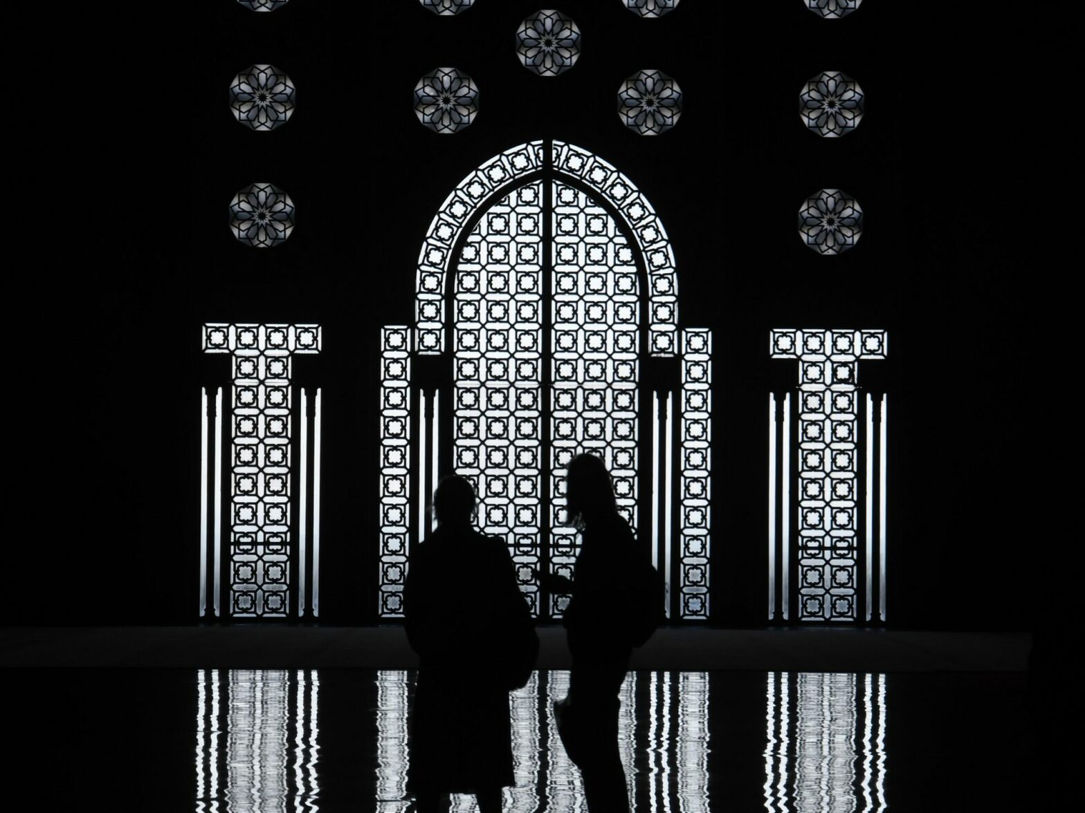 Black and white photo of the Hassan II Mosque in Casablanca, Morocco Wednesday March 4, 2020. Completed in 1993, it is the largest mosque in Africa and the only one in Morocco that non-Muslims are allowed to enter