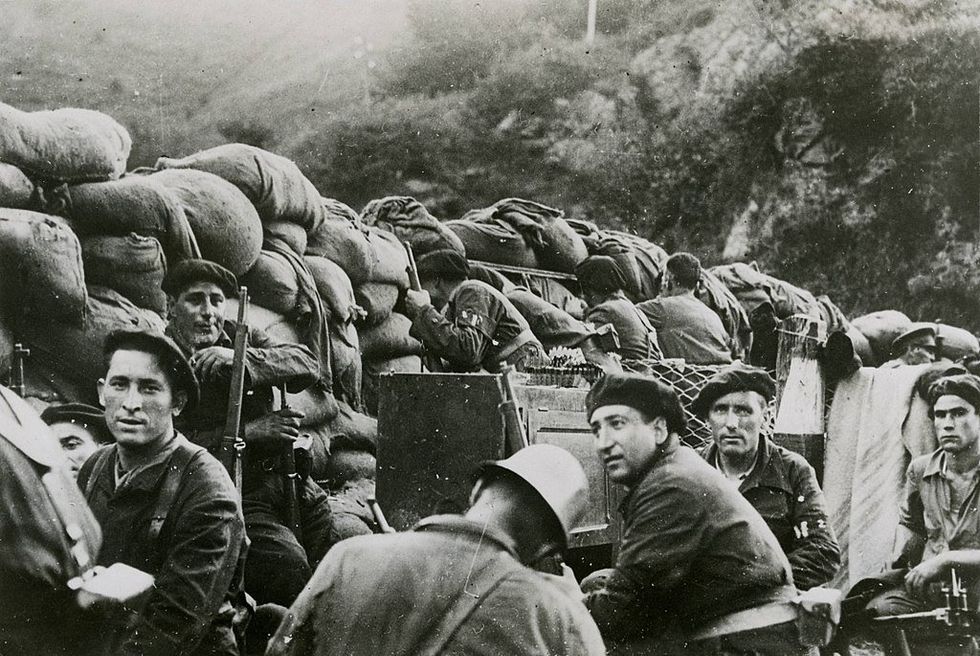 black and white photo of troops in spain