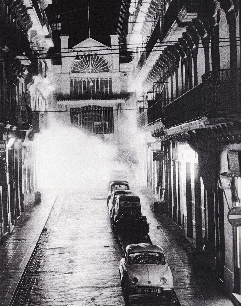 Black and white photograph of an explosion in the Bab-el-Oued neighborhood.