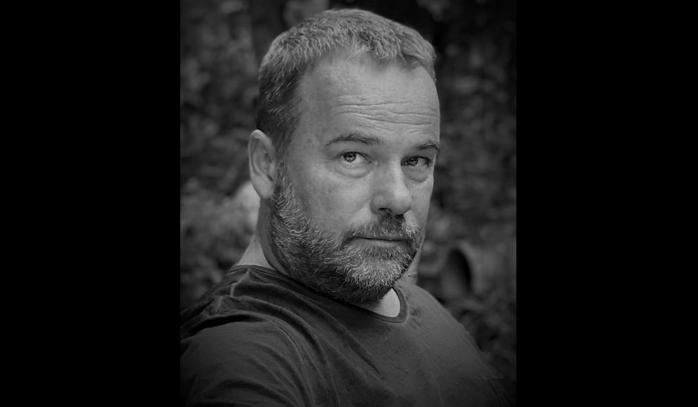 Black-and-white portrait of ​Dr. Stephan Kostrzewa, Gammeloase founder