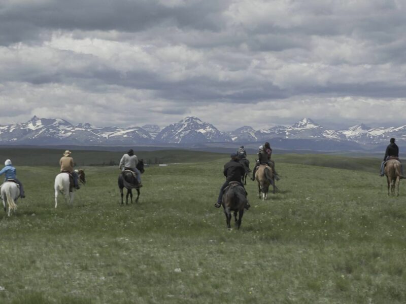 Blackfeet Indians horse-riding in reservation​
