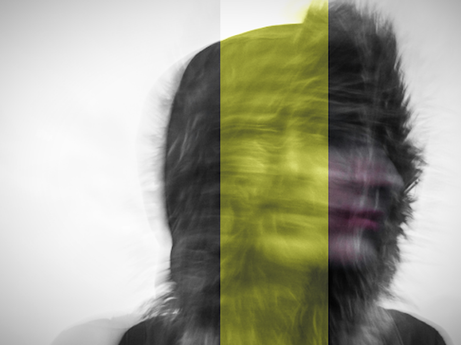 Blurred photo of a person's face and a furry hood