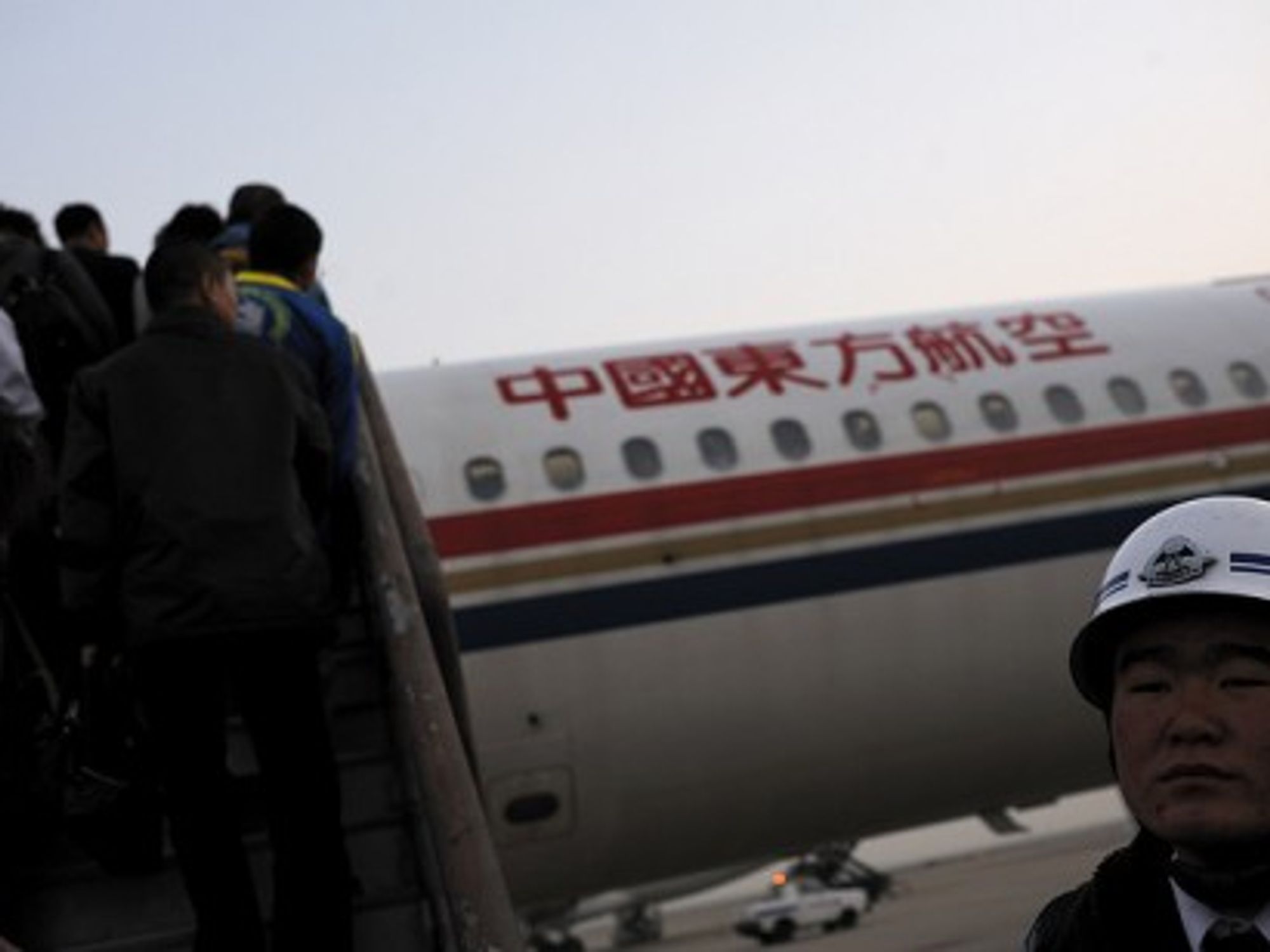 Boarding China Eastern Airlines at Shanghai airport where a Lucky Airlines pilot recently made news (Ed-meister)