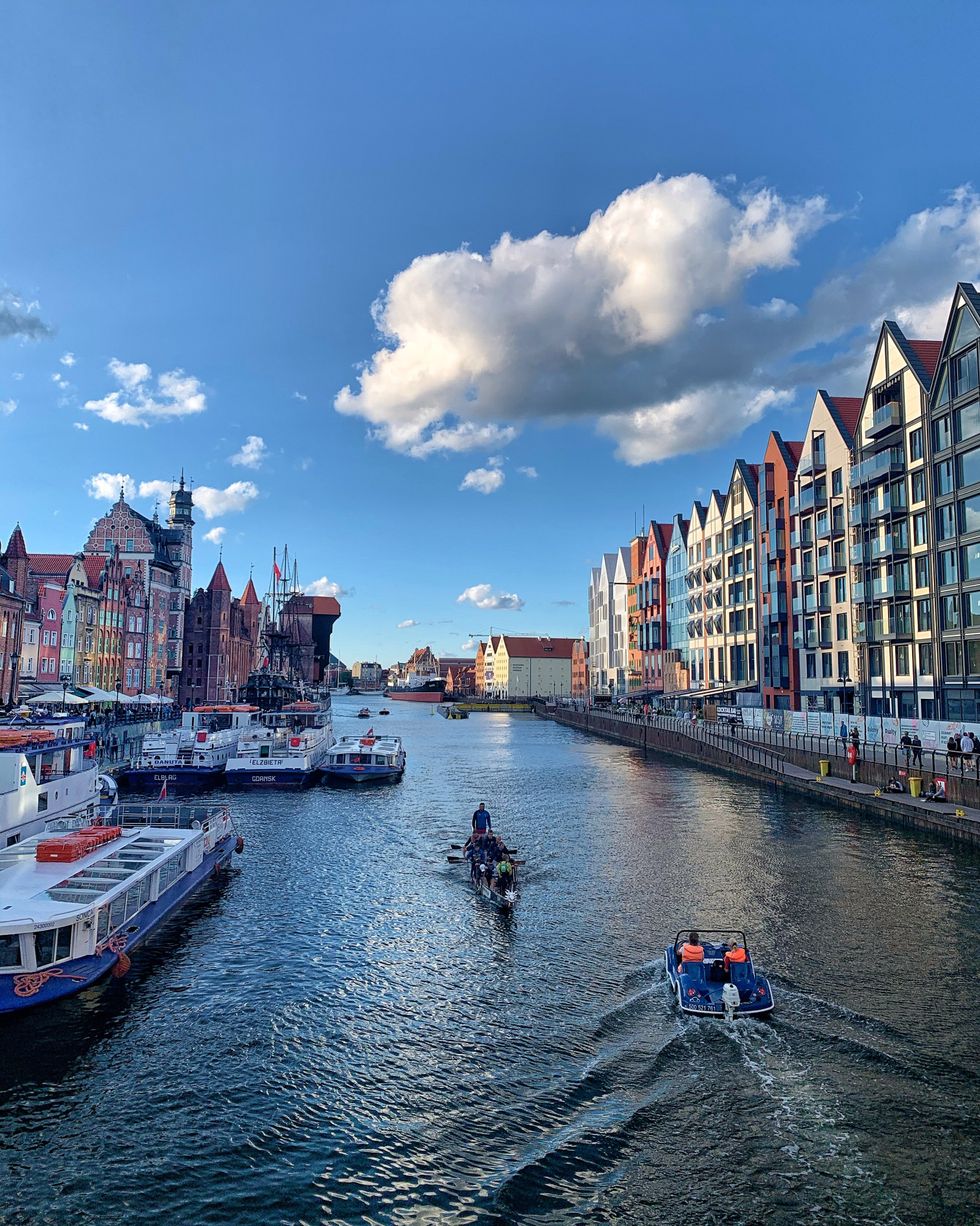 Boats on the Motlawa river in the Old Town of Gdańsk, Poland.