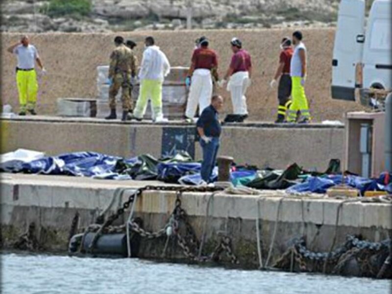 Bodies lined up on the dock in Lampedusa's main port