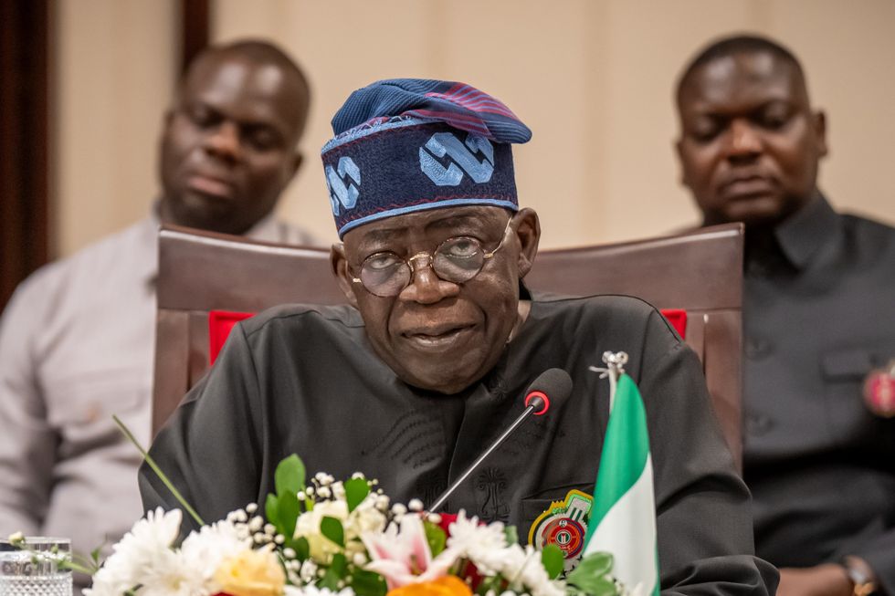 Bola Tinubu, President of Nigeria, attends a press conference at State House.