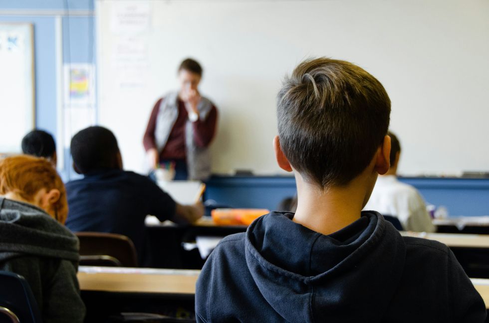 Boy in a classroom.