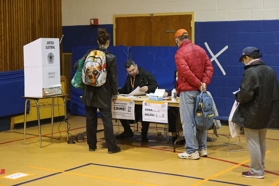 Brazilian Immigrants voting in Brazilian Presidential Election in a high school.