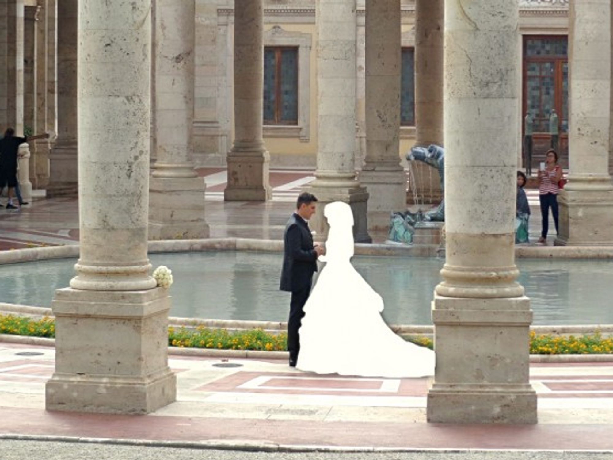 Bride and groom hold hands at their wedding in Italy