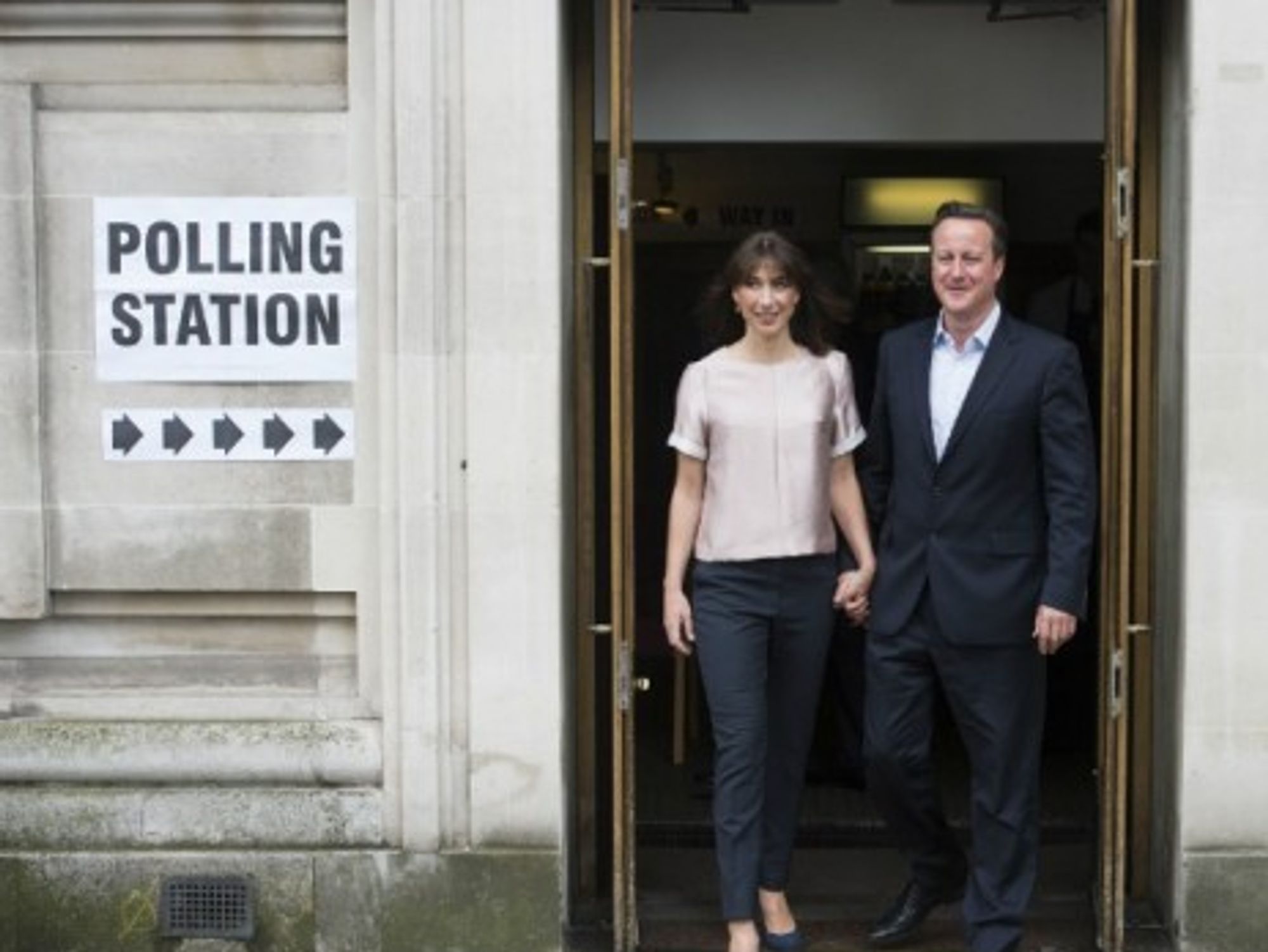 British PM David Cameron and his wife Samantha vote in the 2014 European Parliament elections.