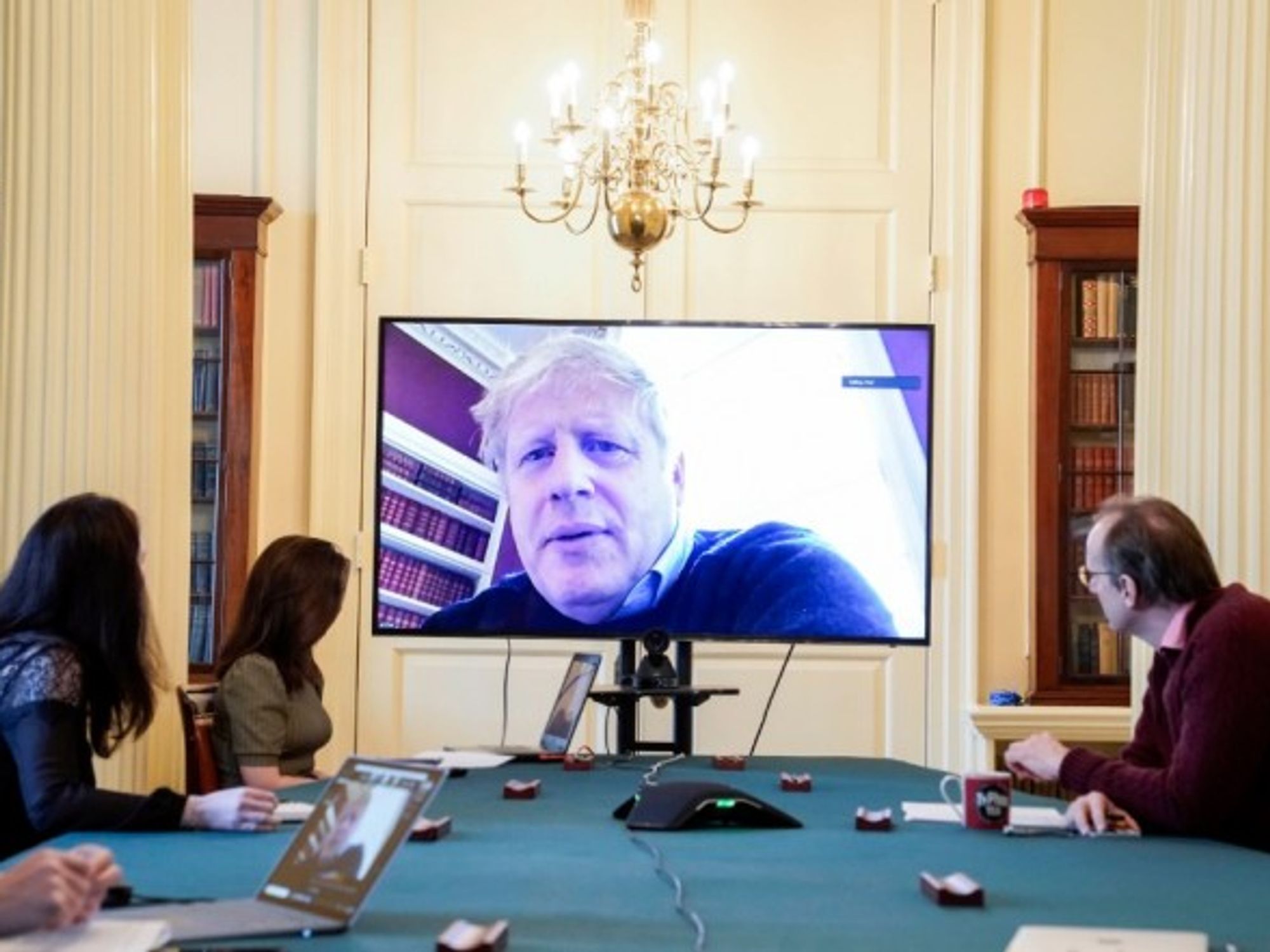 British Prime Minister Boris Johnson chairs a morning COVID-19 update meeting remotely during his self-isolation.