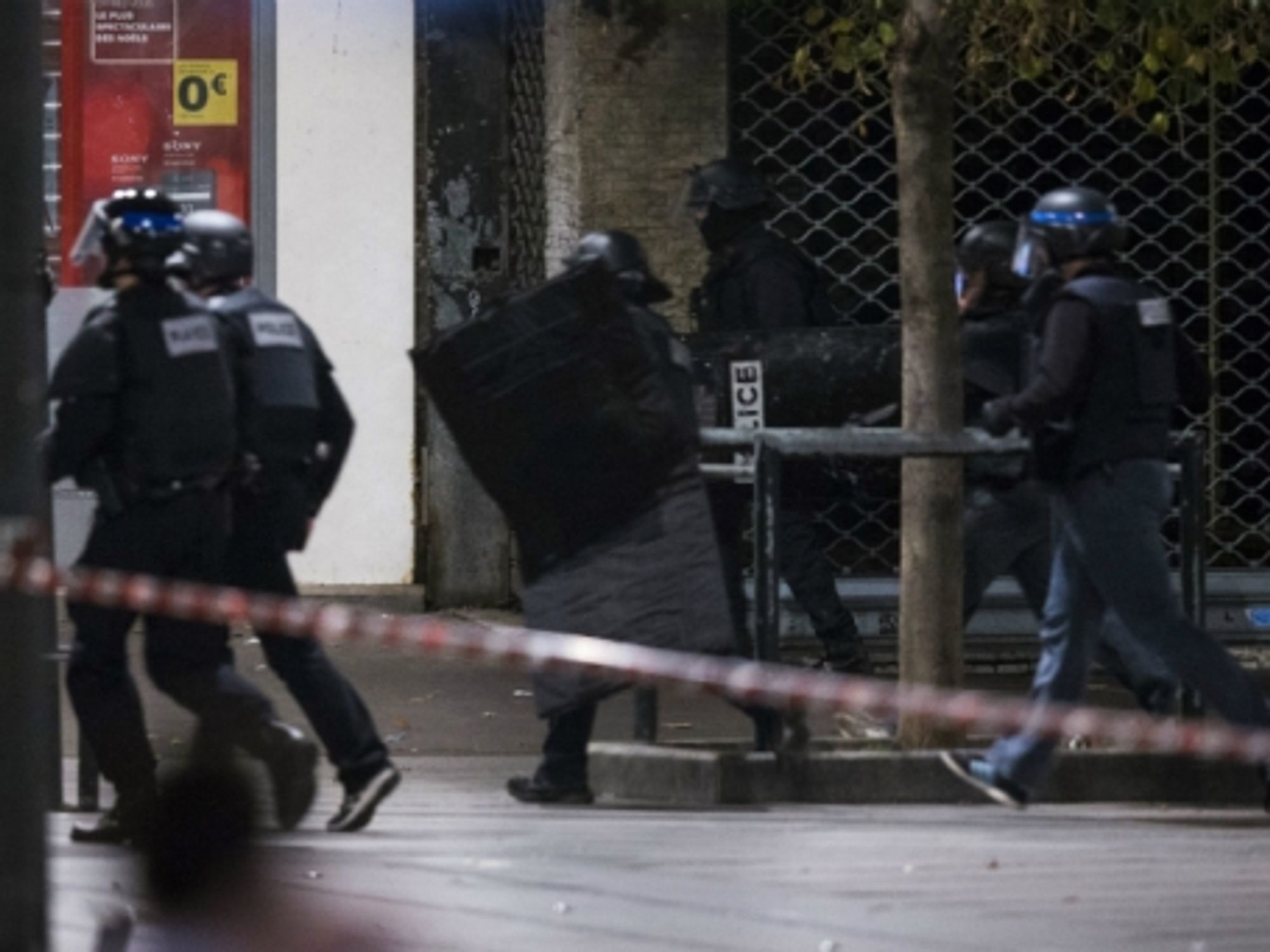 Brussels Police Conduct Raids, French PM Warns Of Chemical Attack