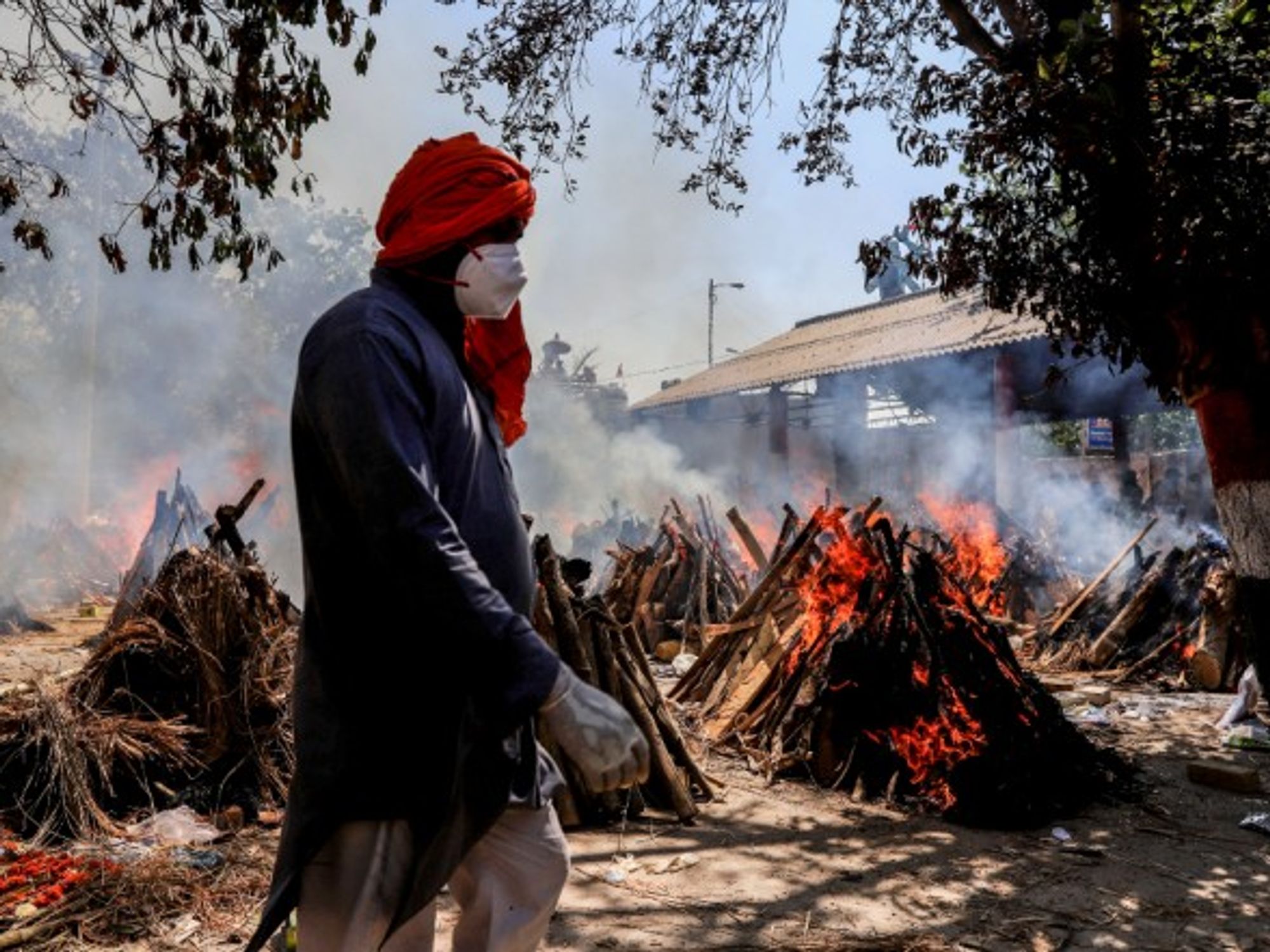 Burning pyres at a crematorium in New Delhi