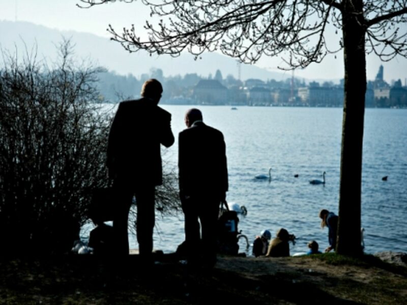 Businessmen by Lake Zurich