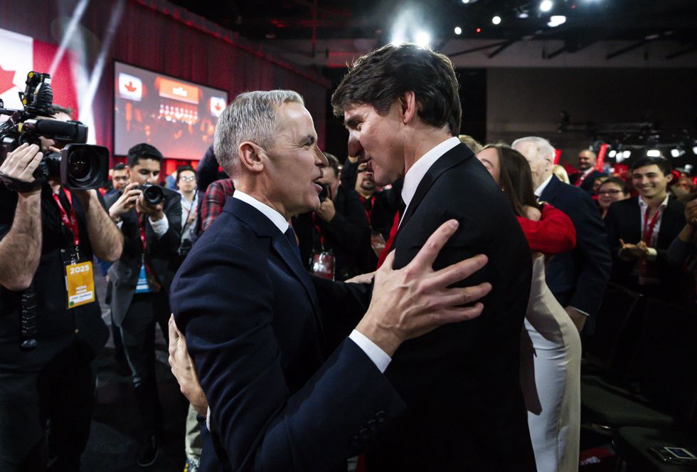 Carney-Trudeau embrace