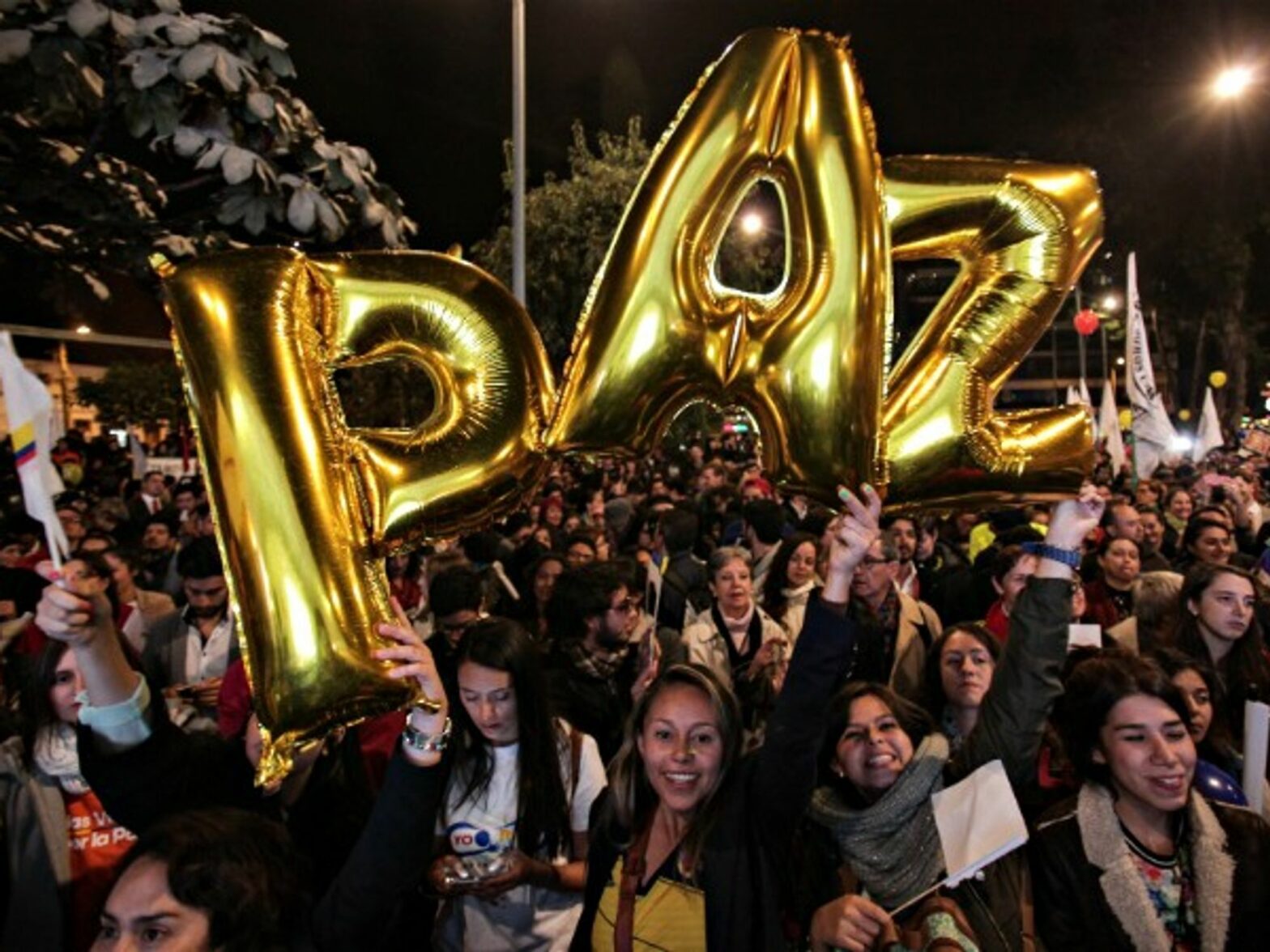 Celebrating the peace deal with balloons in Bogota on Aug. 24