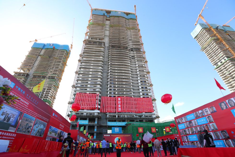 Celebration for the capping ceremony of the D01 residential building of the Alamein Downtown Towers Project in Egypt.