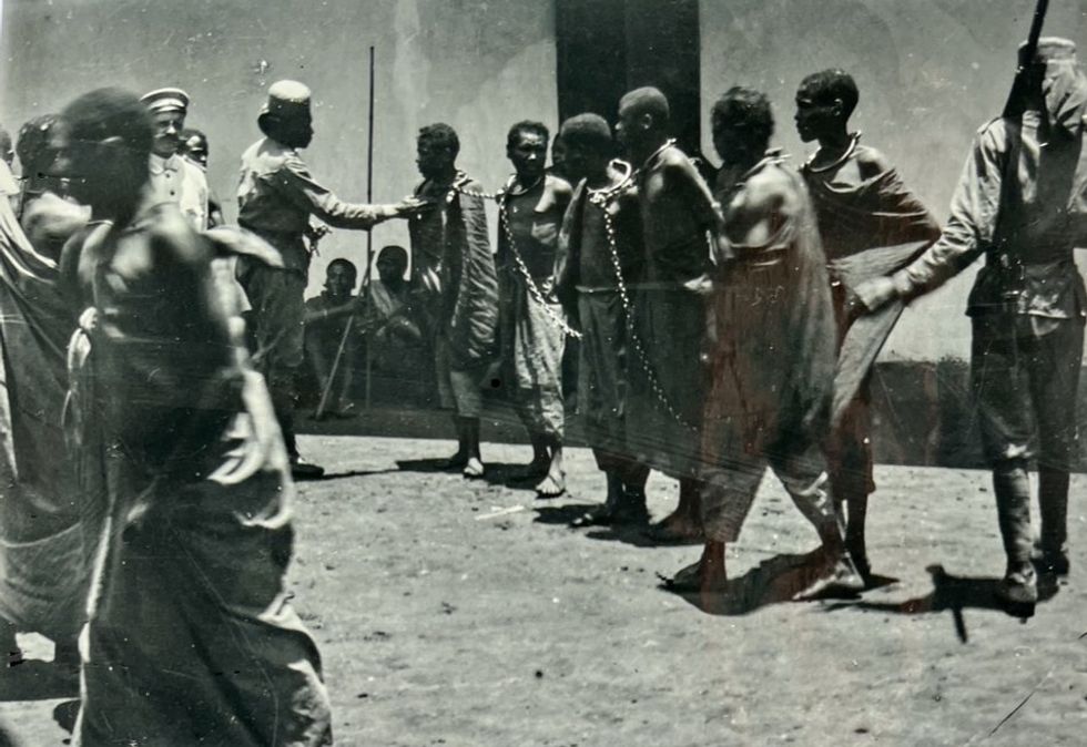 Chaggas are held as captives by German troops in Moshi, northern Tanzania, 1890s.