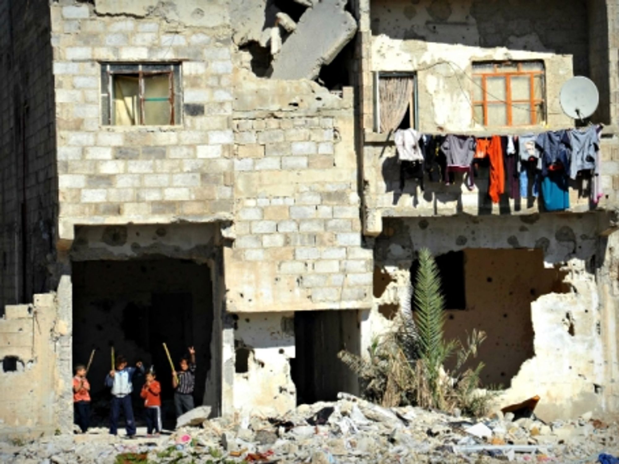 Children playing in Dukhaniyeh, in the suburbs of Damascus, Syria