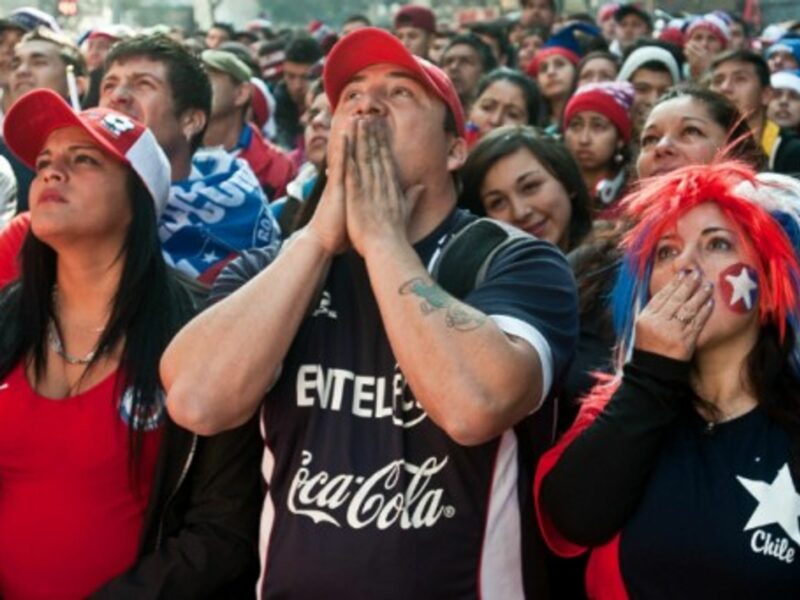 Chile's fans react to their team's defeat against Brazil