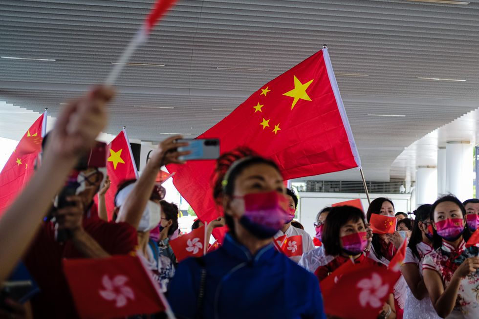 China supporters celebrate the 25th anniversary Hong Kong handover to China.​