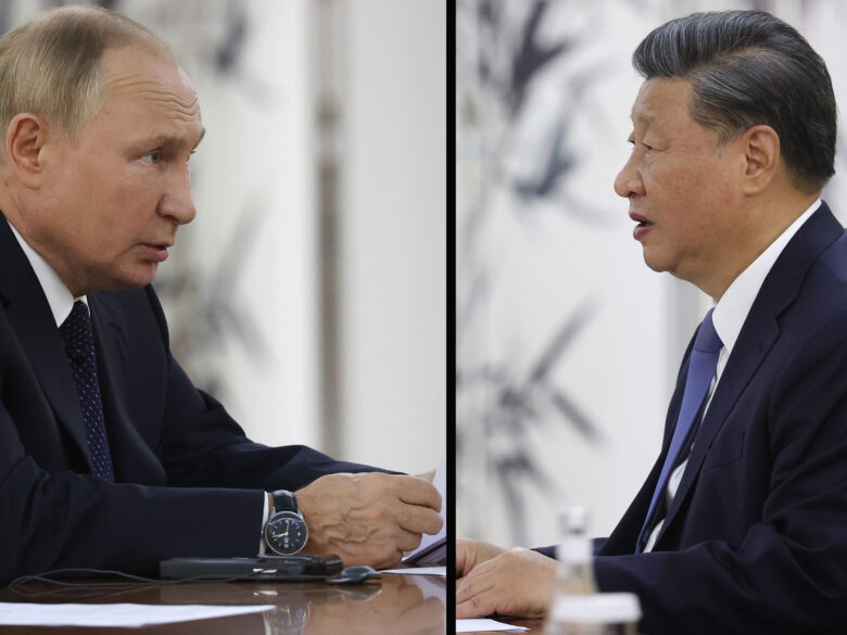 Putin Appears Eager To Please Xi At First Meeting Since Invasion