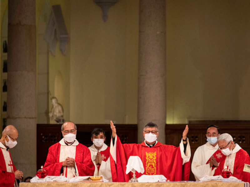 Chinese catholic priests celebrating mass