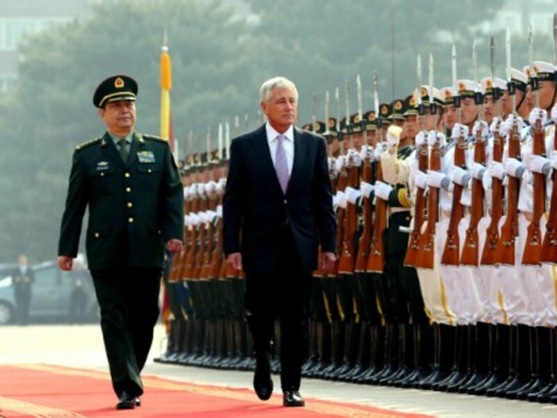 Chinese Defense Minister Chang Wanquan and U.S. Defense Secretary Chuck Hagel review the honor guard in Beijing